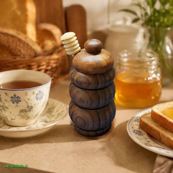 ظرف عسل خوری چوب گردو به همراه قاشق چوبی دستساز ظرف عسل خوری چوب گردو به همراه قاشق چوبی دستساز مناسب سرو عسل و شیره